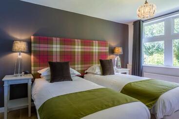 تختخواب و صبحانه The Garden House