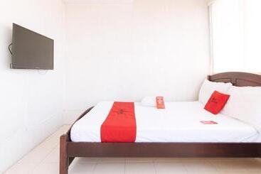 فندق Reddoorz Plus @ E Rodriguez Corner Banawe