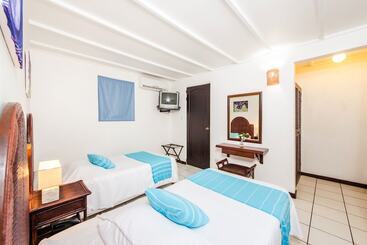 בית מלון כפרי Pueblo Dorado