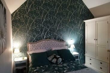 مبيت وإفطار Le Clos Des Augers. Chambre Descartes