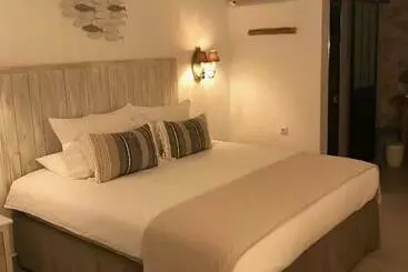 Bed & Breakfast Finca Pura, Clothing Optional Guestrooms