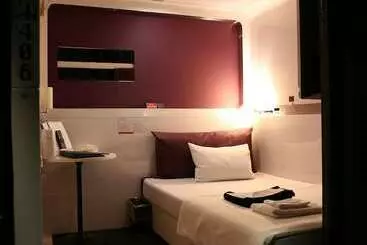 Капсульный Oтель First Cabin Midosujinamba