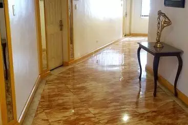 Отель Lourdes Suites