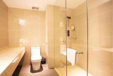 בית מלון כפרי City Comfort Inn Nantong Qidong Renmin Zhong Road Xingfudao