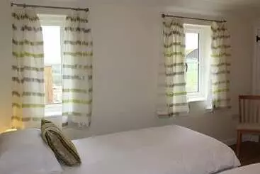 Mökkimajoitus The Milking Parlour