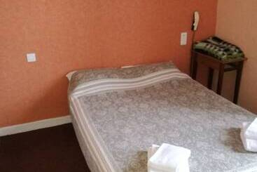 فندق Hôtel Au Jardin St Michel