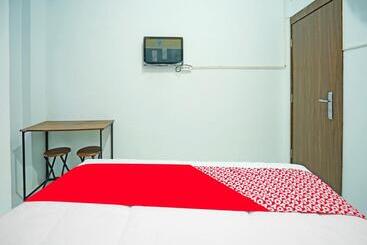 Отель Oyo 91559 Kost Bangau Syariah