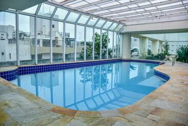 游客公寓 Flat C Varanda Na Praia De Pitangueiras Guaruja Sp