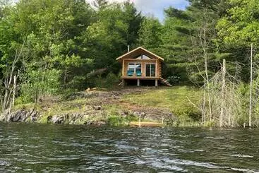Apartamentos turísticos Romantic Log Cabin On Elkwoods Lake