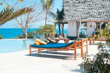 Отель Kusini Beach Bungalows