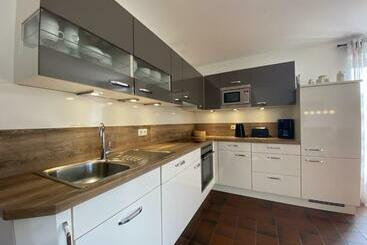 Turistlägenheter Doppelhaushälfte Strandhus