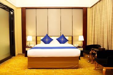 Junhao Hotel Dongguan Shanmei Metro