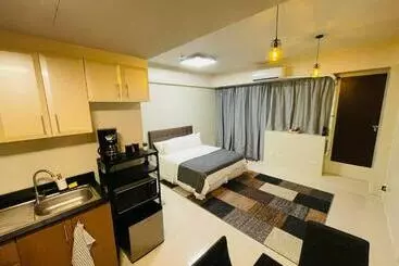 Huoneistohotelli One Palm Tree Villas Short Walk Via Runway Manila Naia T3