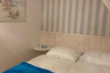 펜션 Pokoje Pinokio