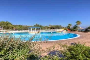 Отель Villaggio Camping Internazionale Manacore