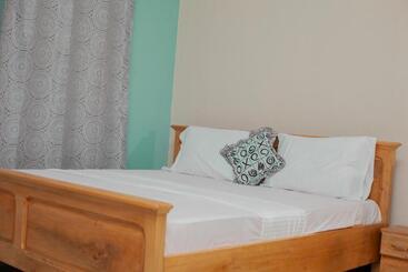 ペンション Patayo Lodge