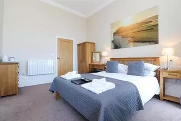 مبيت وإفطار Beach Front Guest House