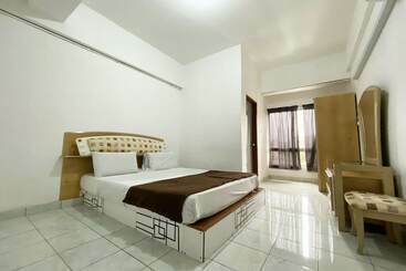 Hotel Oyo 90184 Api Api Guesthouse 533