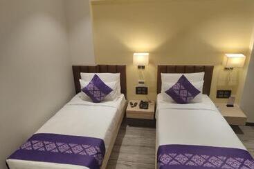 Hotel Purple Beds By Vits Dwarkesh, Surat
