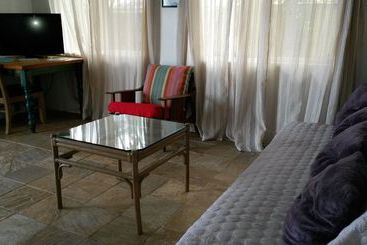 Жильё для туристов Rocky Point Beachfront/paradise