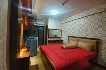 Отель Oyo 91338 Apartment Bekasi Town Square