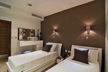 Lägenhet The Hillock Residences