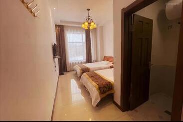 Yabuli Qingyun County Xin Ding Apartment