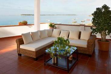 Отель Laguna Dei Fenici