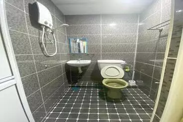 ホテル Oyo Home 90904 Ray Yan Guesthouse