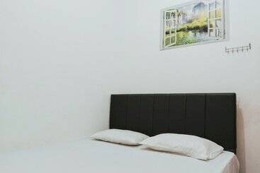 בית מלון כפרי Eleven Guest House Syariah