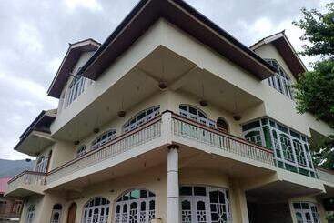 Pensión Coachman Homestay