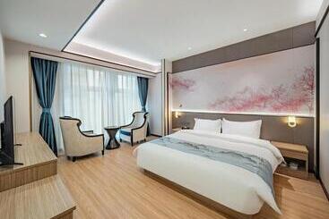 Evening Breeze Hotel 晚风酒店