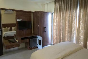 Отель Manasi Pride