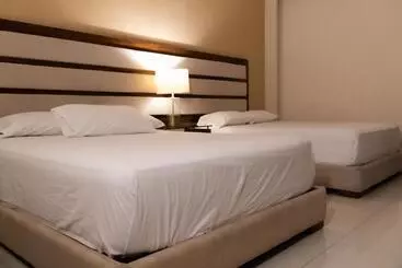 هتل آپارتمان Infinity Suites Habitación Triple 209