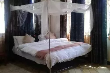 تختخواب و صبحانه Kisasa Home