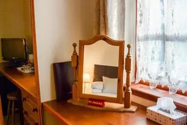 Pensió Clarke Cottage Guest House