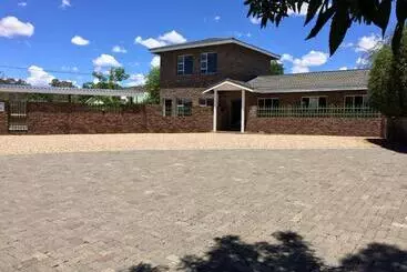 Pension Sunset Chalets & Sca