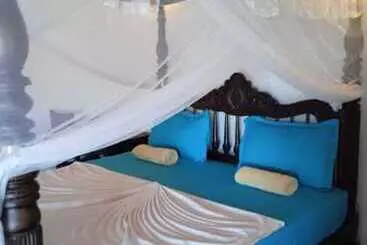 Pensjonat Pearl Cave Cabanas & Resturant