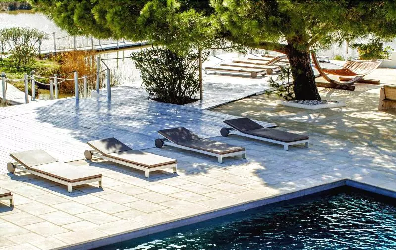 فندق Mas De La Fouque   Hôtel & Spa