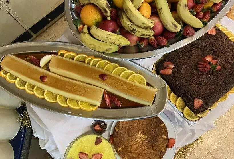 Gaddis Hotel, Suites And Apartments