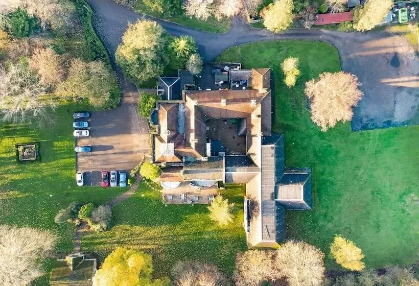 בית מלון כפרי Woodland Manor