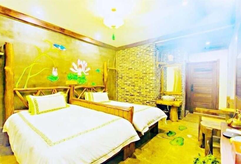 هتل Dielianhua Cowherd Inn Zhangjiajie