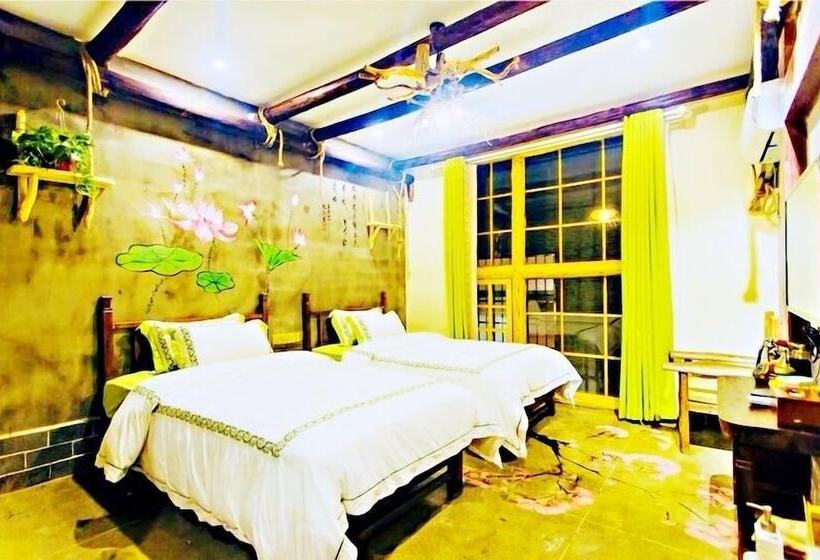 هتل Dielianhua Cowherd Inn Zhangjiajie