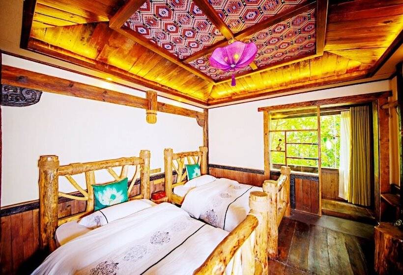 هتل Dielianhua Cowherd Inn Zhangjiajie