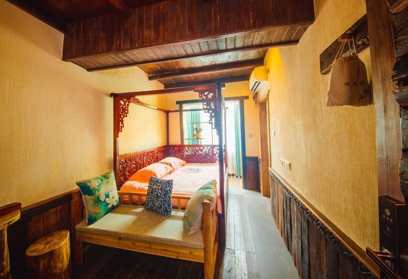 هتل Dielianhua Cowherd Inn Zhangjiajie