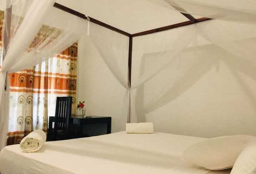 ペンション Sea Shells Inn Arugambay