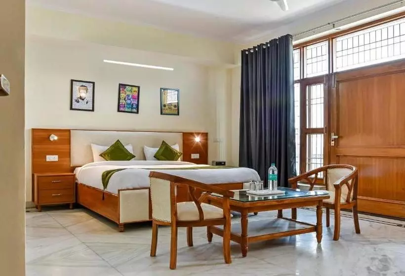 ホテル Treebo Trip Cosmo Botanical Garden