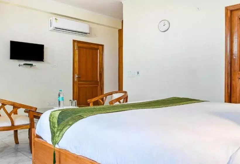 ホテル Treebo Trip Cosmo Botanical Garden