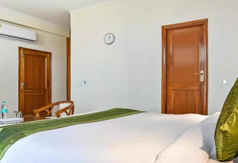 ホテル Treebo Trip Cosmo Botanical Garden