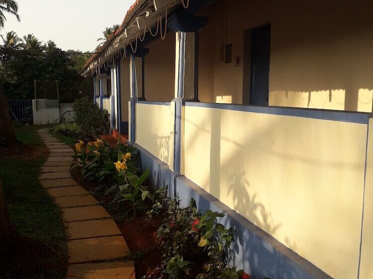 בית מלון כפרי Dhuni Resorts Goa